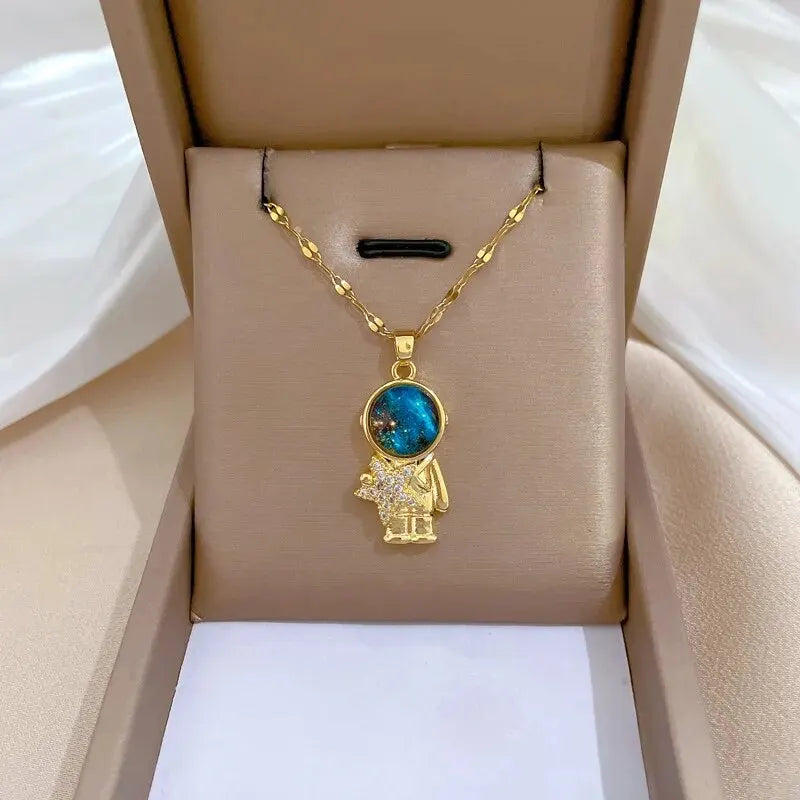 Light Luxury Star Series Necklace for Women – Gold Planet Moon Astronaut Pendant, Titanium Steel Jewelry Gift