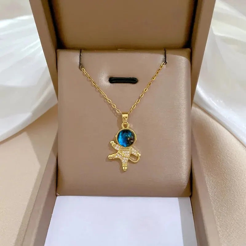 Light Luxury Star Series Necklace for Women – Gold Planet Moon Astronaut Pendant, Titanium Steel Jewelry Gift