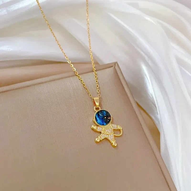 Light Luxury Star Series Necklace for Women – Gold Planet Moon Astronaut Pendant, Titanium Steel Jewelry Gift